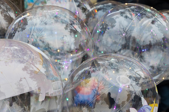 large, gleaming, colorful, transparent bubbles