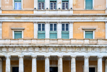 Obraz premium Athens, Greece Parliament building architectural detail. Marble columns and windows with green shutters.