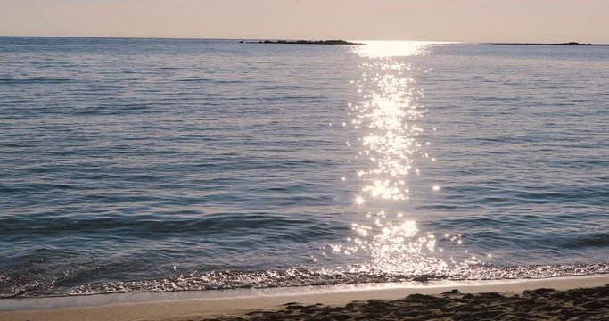 Tramonto con il sole sull'acqua - Porto Cesareo - Salento
