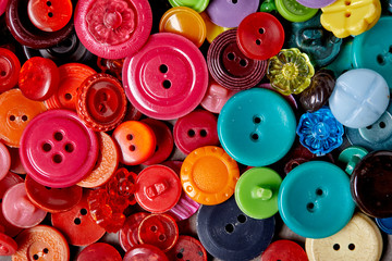 Background and texture of multicolored antique buttons