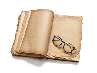 Glasses on the pages of an old book