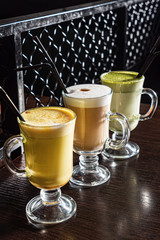 different kinds of cappuccino on the table