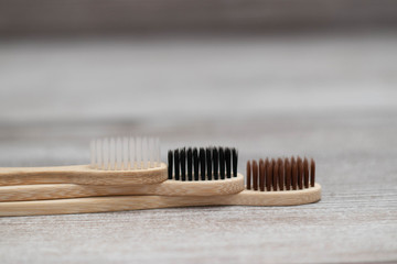 Sustainable lifestyle zero waste concept.. brushes for washing dishes and bamboo toothbrushes,  plastic free items. top view