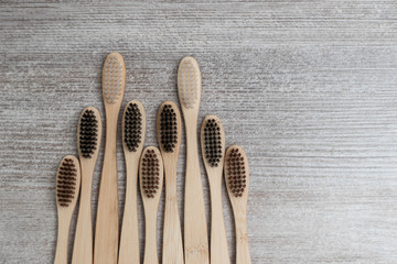 Sustainable lifestyle zero waste concept.. brushes for washing dishes and bamboo toothbrushes,  plastic free items. top view