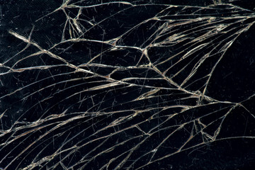 Broken screen smartphone, closeup photo. Background image of a broken screen.