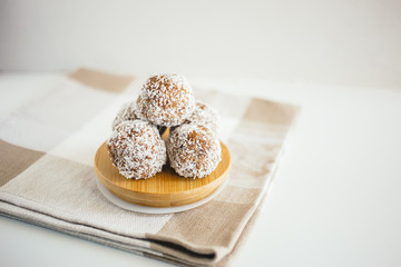 Energy balls in a plate on a light background.