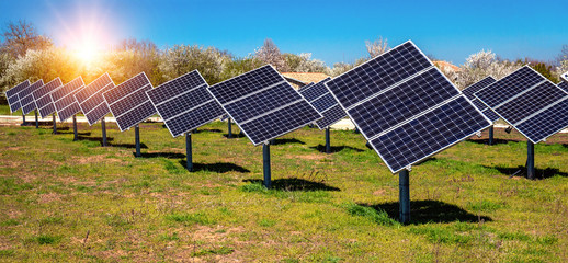 Solar panels, photovoltaics, with sun tracking systems -  alternative electricity source, concept...