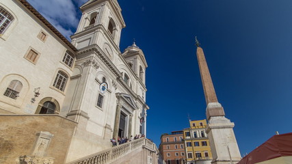 Obraz premium Church of Trinita dei Monti and Egyptian obelisk timelapse in Rome in Italy.