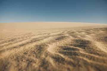 Fototapeta na wymiar Desert dunes taken with a shallow depth of field