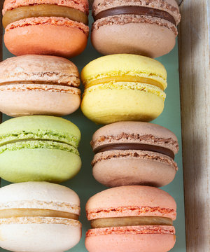 assortment of macaroon cookies isolated on white