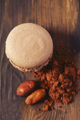 chocolate macaroon on brown wooden surface
