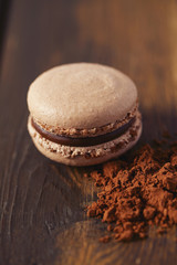 chocolate macaroon on brown wooden surface