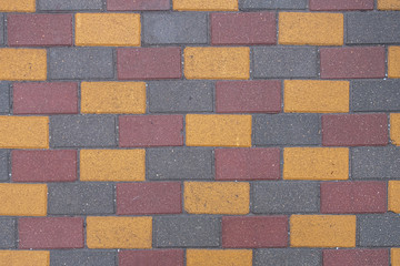 abstract background of colored tiles on the track in the park