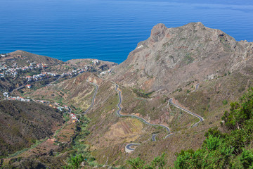 Fototapeta na wymiar Winding serpentine through Anaga Mountains to the small village in Anaga Country Park, Tenerife, Canary Islands, Spain.