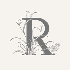 Decoration with letter R, decorative flowers and bird.