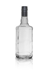 Empty glass bottle of square shape for whiskey, closed with a metal stopper. Isolated on a white background with reflection