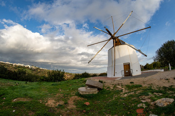 Windmill (moinho) in Albufeira Portugal, taken with a fish eye lens on a sunny day