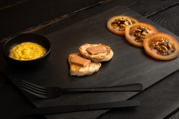 Pork tenderloin dish with pate and tomato and walnut salad