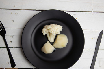 cooked cauliflower dish with potatoes