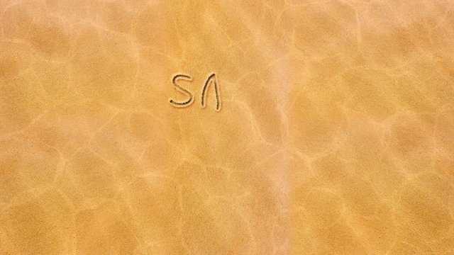 The inscription in the sand - Save the world.