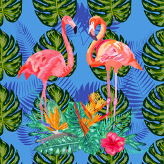 Beautiful seamless floral exotic pattern with tropical flowers, palm leaves, jungle plants, hibiscus, bird of paradise flower, pink flamingos.