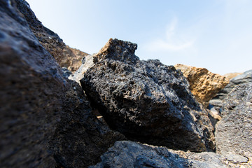 Industrial photography. Volcanic rock at the quarry. Natural stone for the manufacture of blocks...