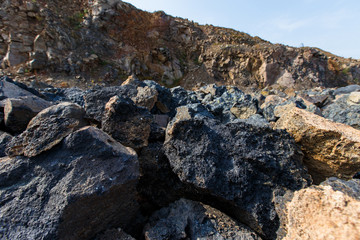 Industrial photography. Volcanic rock at the quarry. Natural stone for the manufacture of blocks and bricks