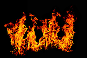 Fire flame isolated on black isolated background - Beautiful yellow, orange and red and red blaze fire flame texture style.