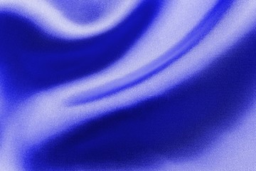 Smooth elegant blue fabric silk or satin texture for background.