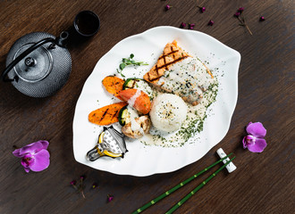 salmon steak with rice and vegetables