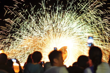 Fire show performance at a beachfront restaurant in Thailand tourist attraction