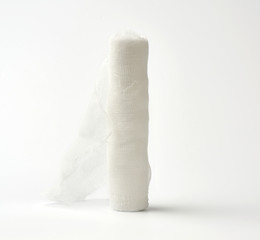 roll of white gauze bandage on a white background