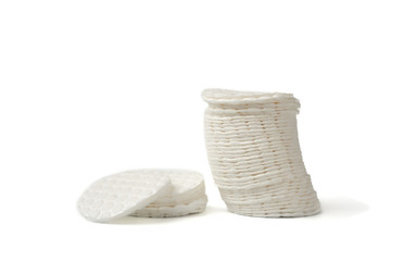 stack of white cotton pads isolated on white background