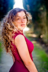 Fototapeta premium Portrait of beautiful woman in the park