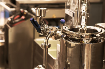 pharmaceutical industry. Production line machine conveyor at factory with bottles