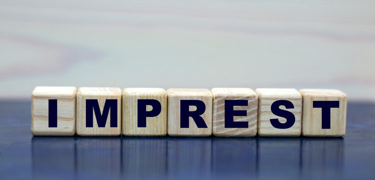 concept word imprest on cubes on a beautiful blue background