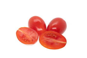 Fresh plum tomatoes on white background