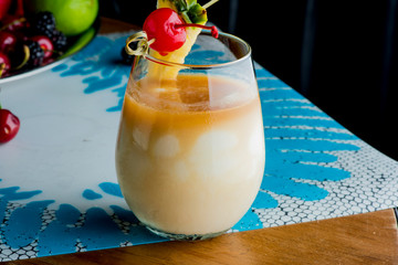 Frozen pina colado. Traditional classic Hawaiian or tiki bar tropical drinks. Drinks w/  dark aged...
