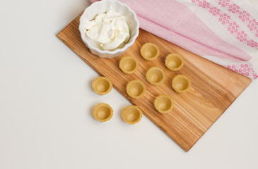 Fototapeta na wymiar Tartlets with custard or cottage cheese.