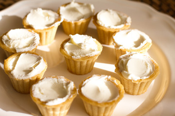 Tartlets with custard or cottage cheese.