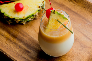 Pina colada. Frozen tropical cocktails. Traditional classic Hawaiian or tiki bar tropical drinks....