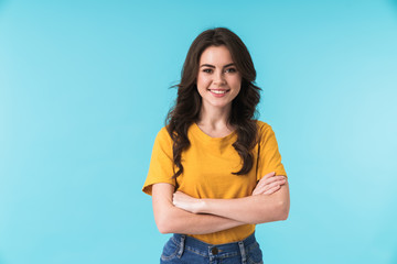 Positive young pretty woman posing isolated