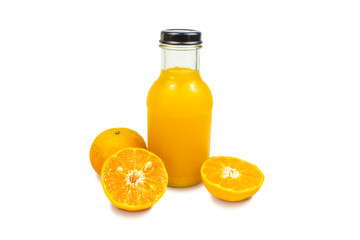 Glass of orange juice  with bottle on white background. Fruit for health