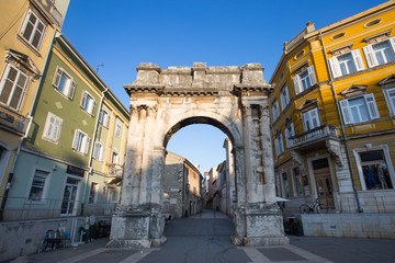 Fototapeta na wymiar Triumphal arch Sergijevac – Porta Aurea in Pula