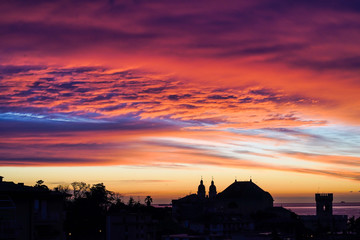 sunrise over a small town silhouette