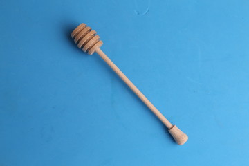 honey stick in color background