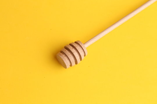 Honey Stick In Color Background