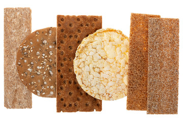 setting of crispbreads isolated on white background, crunchy multigrain cereal seeds