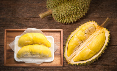 Durian the King of fruits, Durian fruit  on wooden background.durian fruit with delicious golden yellow soft flesh