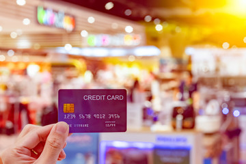 credit card for shopping mall blurred for background